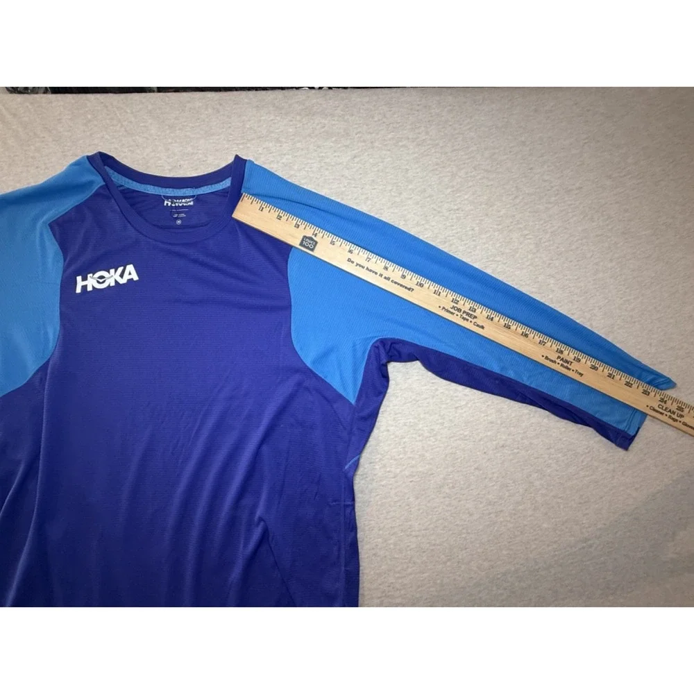 Hoka. Blue fitness shirt. size Medium. Blue 100% polyester 3/4 sleeve shirt